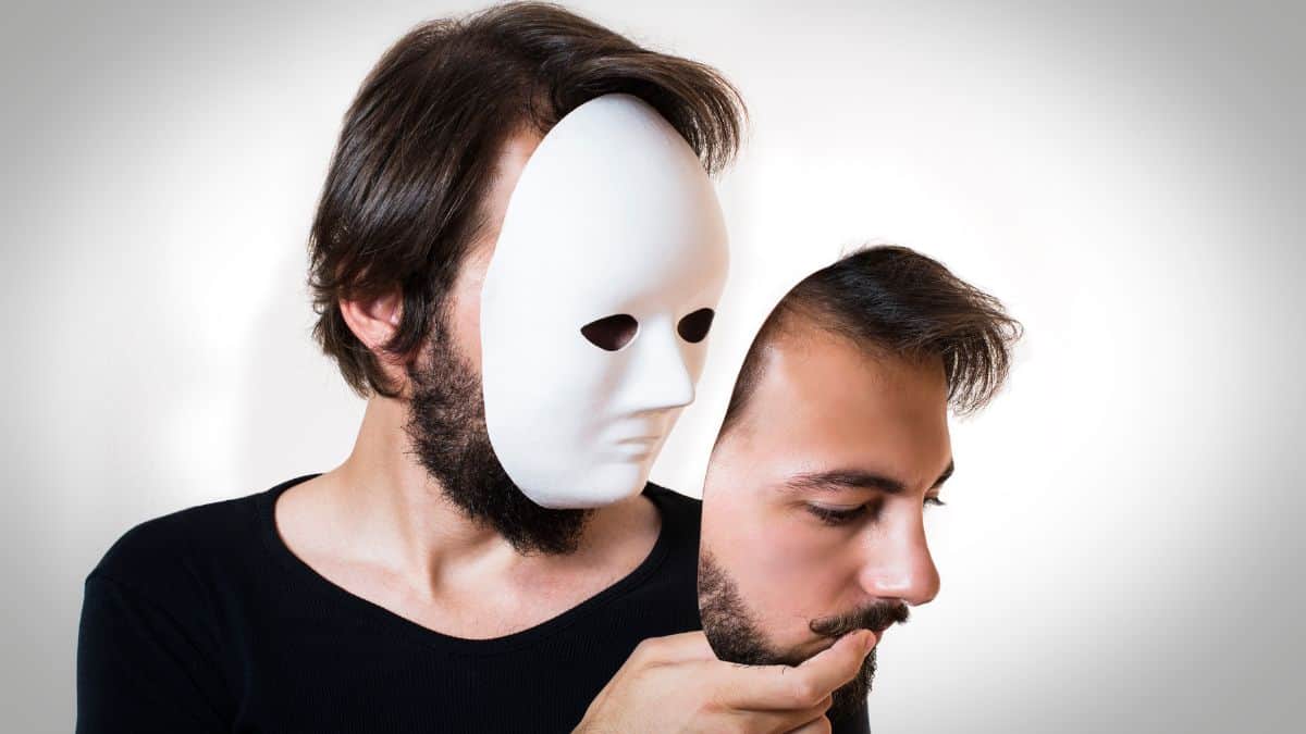 A photo of a man wearing a mask
